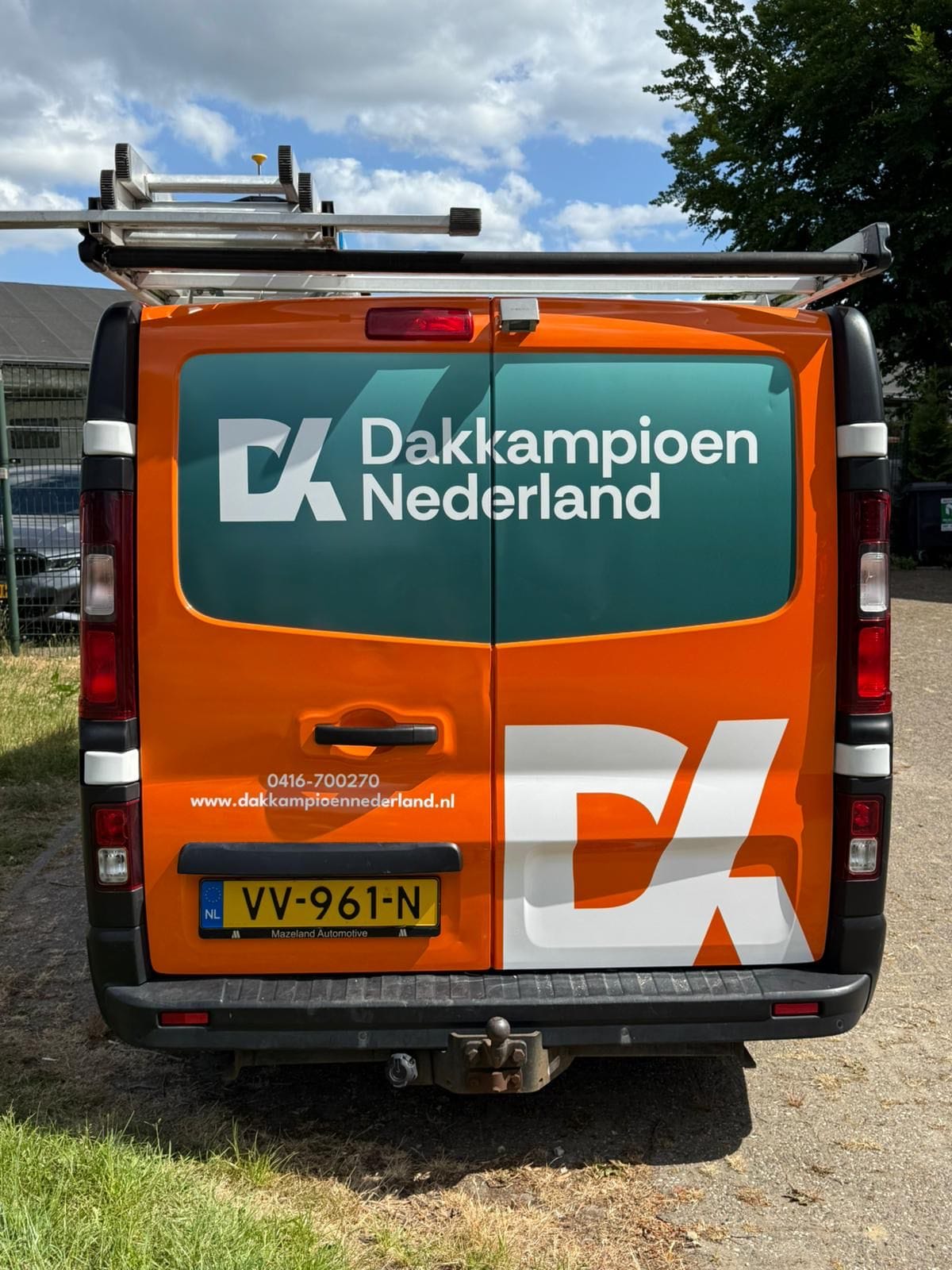 Dakkampioen branding afbeelding busje